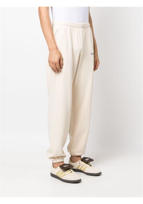 Pantaloni sportivi con stampa logo in beige - unisex SPORTY & RICH | SW851CR