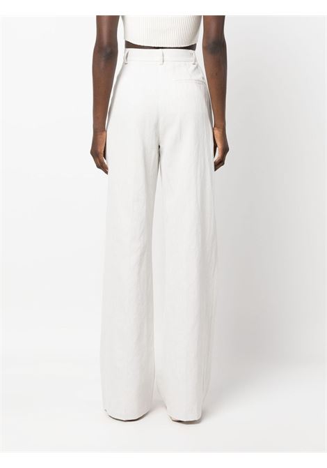 White pressed-crease palazzo trousers - women THE ANDAMANE | TM130401ATNC136WHT