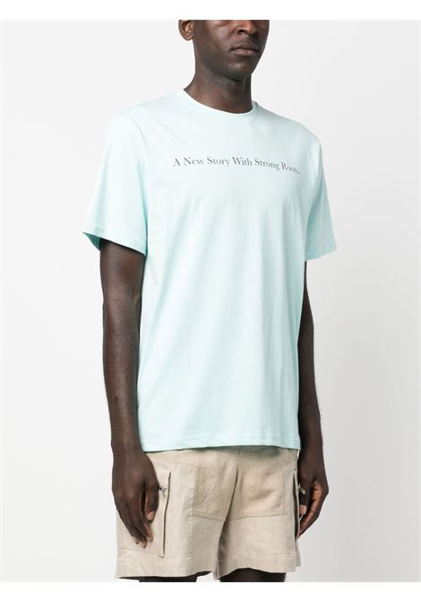T-shirt con stampa grafica in celeste - unisex THROWBACK | DVTROOTSCIELO