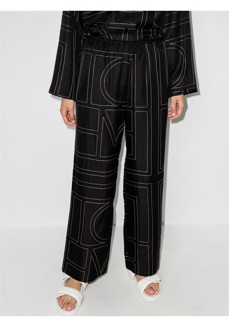 Pantaloni con stampa monogramma in nero - donna TOTEME | 213255707925