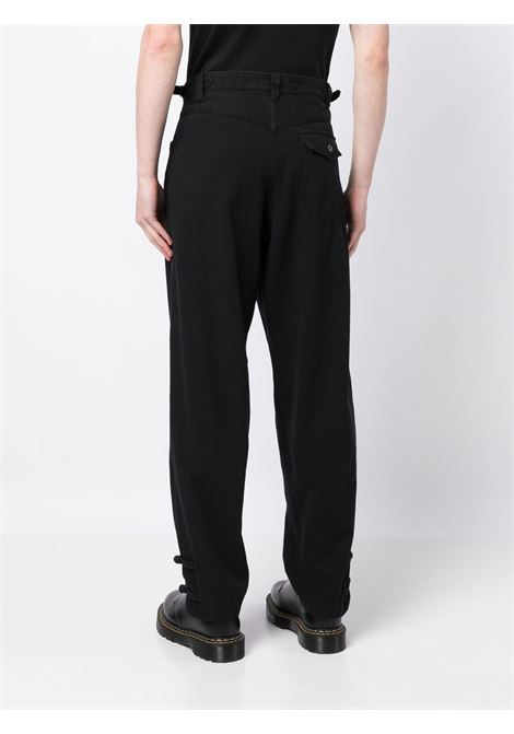 Black hem-strap loose-fit trousers - men UNDERCOVER | UC1C45041BLK