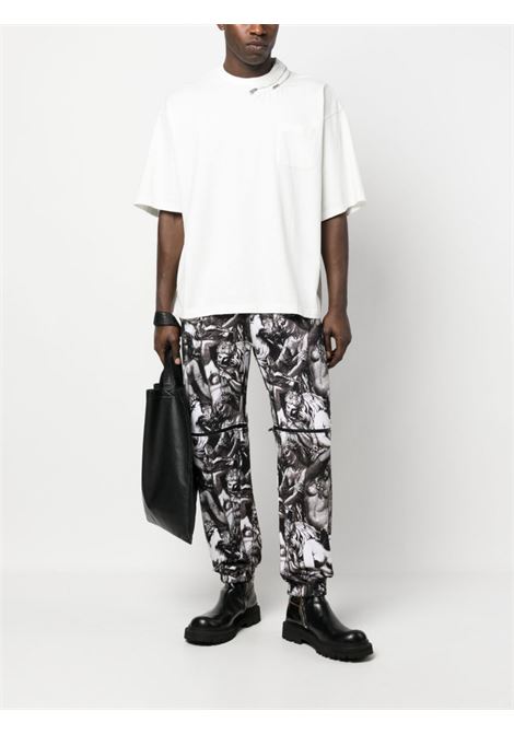 Multicolored graphic-print trousers - men UNDERCOVER | UC1C4508BLKBS