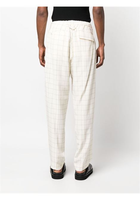 Pantaloni a quadri in bianco - uomo UNDERCOVER | US1C4501IVRYCK