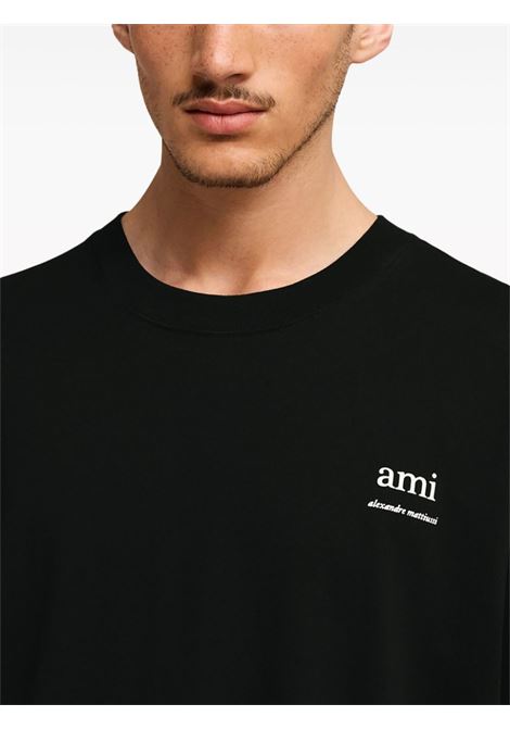 T-shirt con stampa in nero - unisex AMI PARIS | UTS024726001
