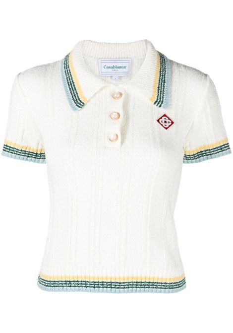 Polo bouclé in bianco - donna