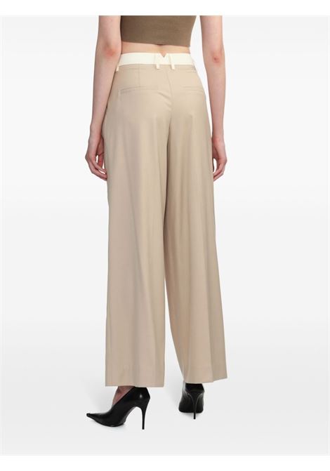 Beige wide-leg tailored trousers - women REMAIN | 5013242764151116