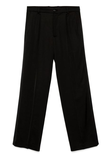 Pantaloni Penrud in nero Dries van noten - uomo DRIES VAN NOTEN | Pantaloni | 2420209219250900