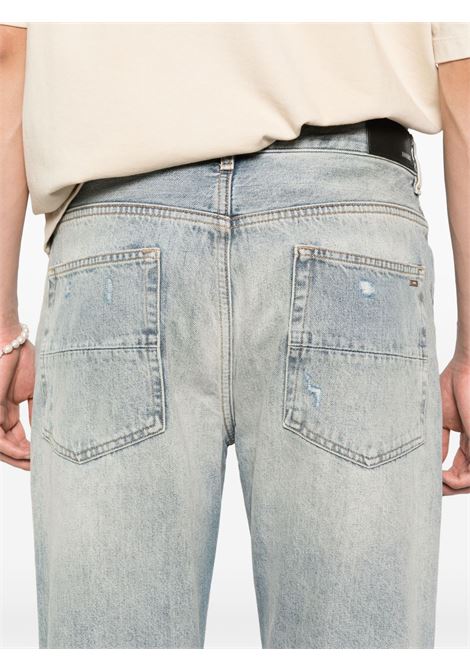 Jeans di cotone in blu Amiri - uomo AMIRI | AMDNGH1085ANTQUINDG