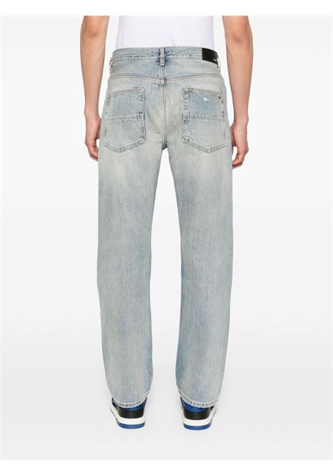 Jeans di cotone in blu Amiri - uomo AMIRI | AMDNGH1085ANTQUINDG