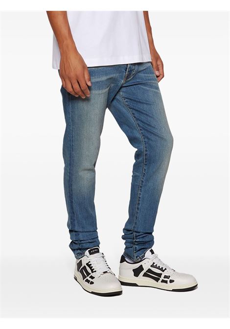 White and black Skel Top Low sneakers Amiri - men AMIRI | AMFOSR1047WHTBLK