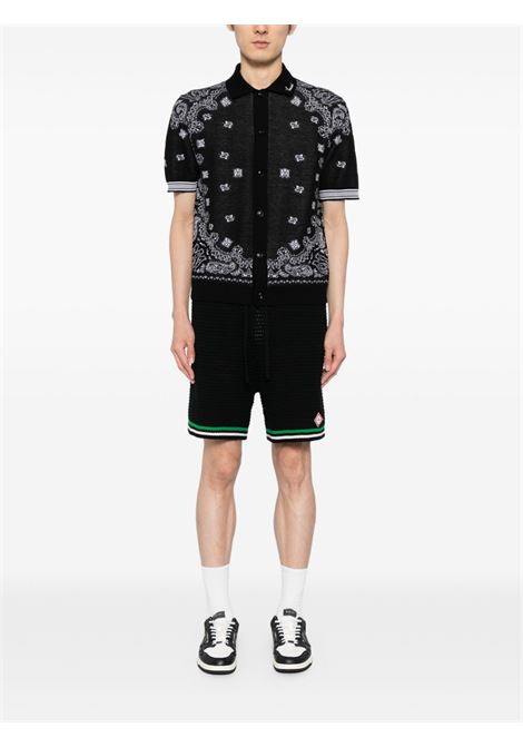 Polo con stampa bandana in nero Amiri - uomo AMIRI | AMKNPO1029BLK
