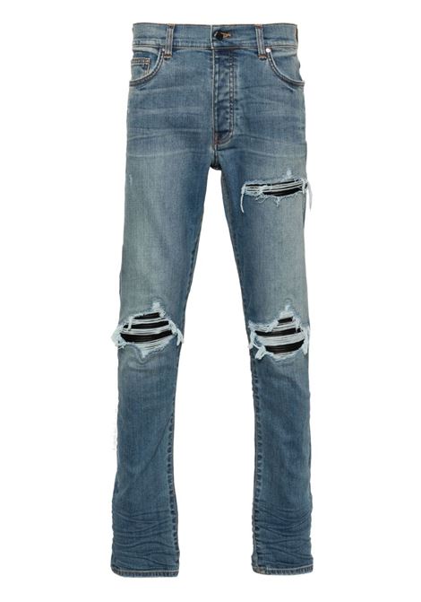 Jeans skinny MX1 con effetto vissuto in blu Amiri - uomo AMIRI | PXMD001DRKINDG