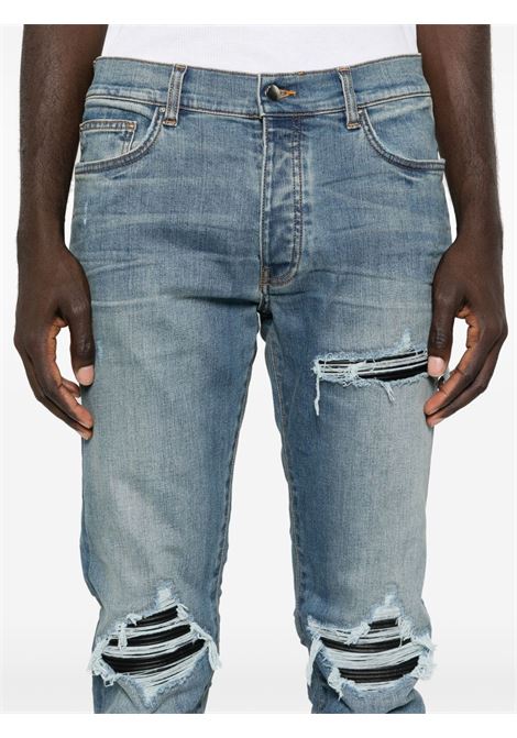 Jeans skinny MX1 con effetto vissuto in blu Amiri - uomo AMIRI | PXMD001DRKINDG