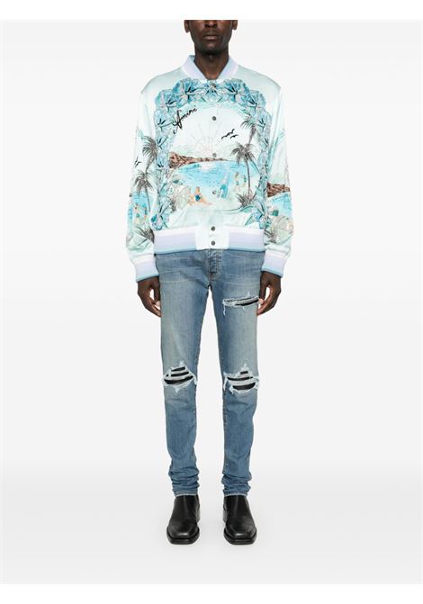Jeans skinny MX1 con effetto vissuto in blu Amiri - uomo AMIRI | PXMD001DRKINDG