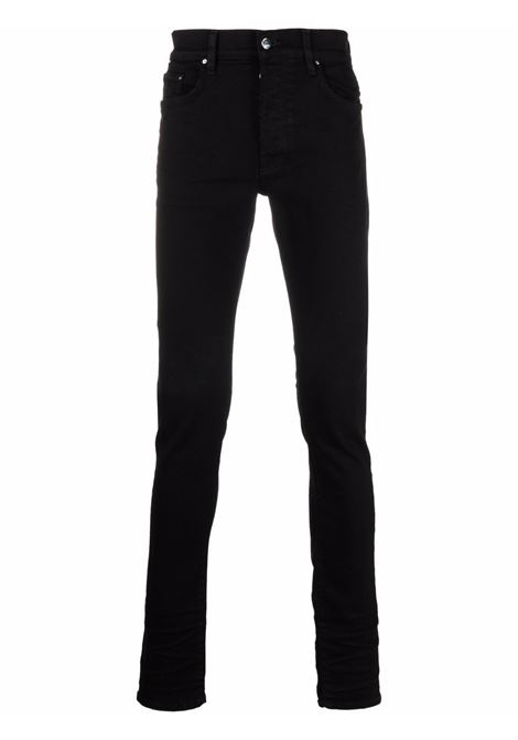 Jeans skinny con applicazione in nero Amiri - uomo AMIRI | PXMD002BLK