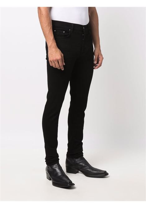 Jeans skinny con applicazione in nero Amiri - uomo AMIRI | PXMD002BLK