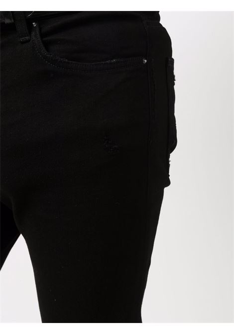 Jeans skinny con applicazione in nero Amiri - uomo AMIRI | PXMD002BLK
