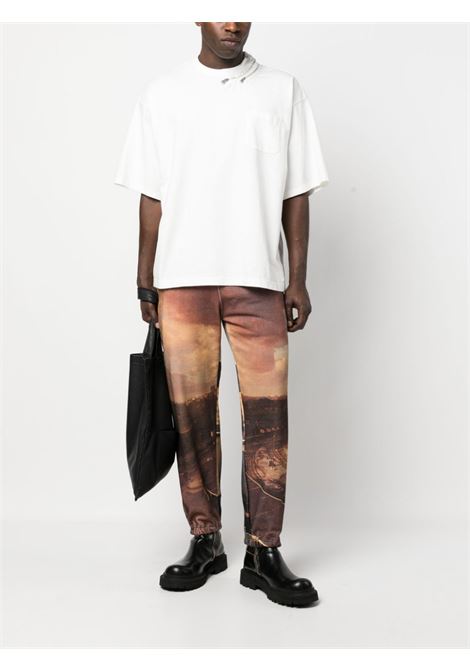 Pantaloni con stampa grafica multicolore - uomo UNDERCOVER | UC1C4507BLKBS