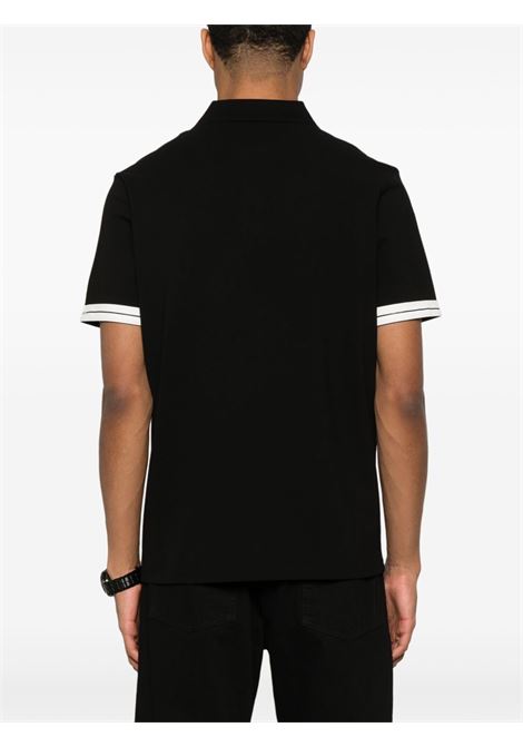 Polo con logo in nero Moncler - uomo MONCLER | 8A0002789ALK999